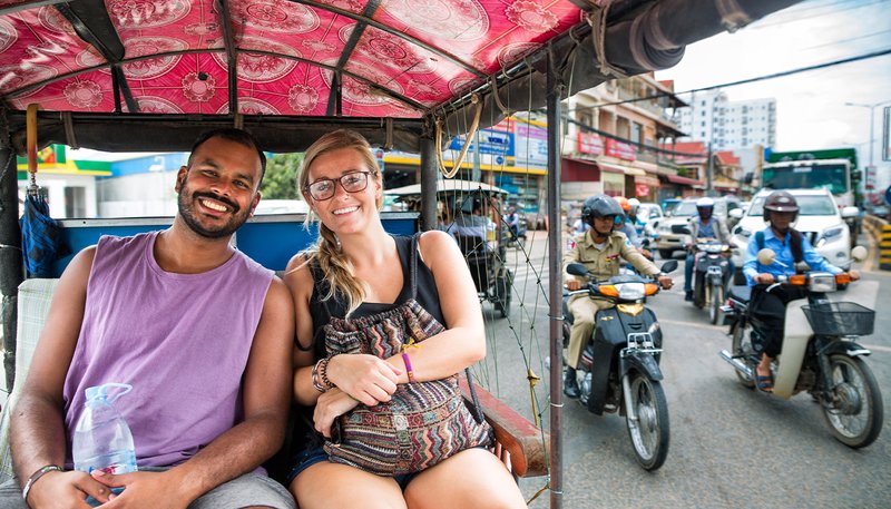 Intro Travel Vietnam And Cambodia Intro Group Tours Couple In Tuk Tuk Phnom Penh