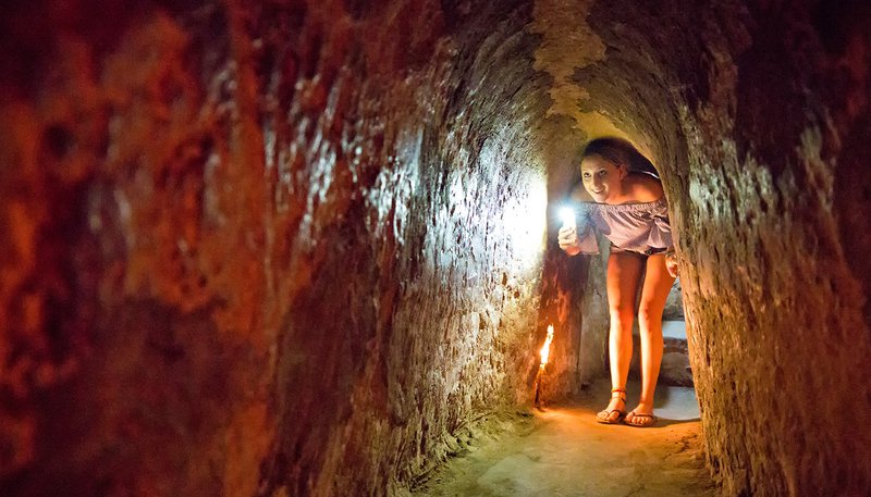 Intro Travel Vietnam And Cambodia Intro Group Tours Exploring The Cu Chi Tunnels